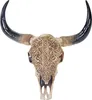 A decorative bull skull with intricate carvings. Podgląd zdjęcia produktu