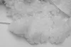 A close-up view of white pillow stuffing, possibly being removed from or placed into a pillowcase. Náhľad obrázku produktu