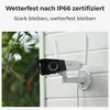 A security camera mounted on a wall during a rain shower, with text highlighting its weather resistance. Produktbild-Vorschau