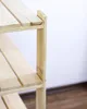 Close-up of a wooden shelving unit. Produktbild-Vorschau