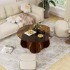 A living room scene with a couch, coffee table, and ottoman. Produktbild-Vorschau