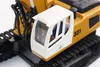 Close-up of a yellow and white toy excavator cab. Náhľad obrázku produktu
