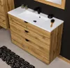 A bathroom vanity with a sink and drawers, with a black faucet and a wooden finish. Produktbild-Vorschau