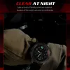 A close-up of a watch on a gloved hand, with text overlay. Náhled obrázku produktu