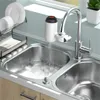 A kitchen sink with a faucet and a water heater attachment. Produktbild-Vorschau