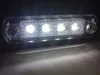 A close-up, slightly angled view of a white LED marker light with a clear plastic housing. Produktbild-Vorschau