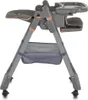 A side view of a gray baby high chair with rose gold accents. Náhled obrázku produktu