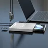 A silver DVD drive with a CD inserted is connected to a laptop. Several USB cables are also visible. Produktbild-Vorschau