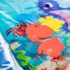 Close-up view of a children's inflatable water play mat with various sea creatures and aquatic plants. Podgląd zdjęcia produktu