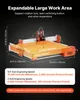 A 3D render of an orange and silver CNC engraving machine with dimensions and specifications overlaid. Produktbild-Vorschau