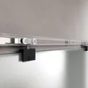 A close-up view of a sliding glass door track and roller system mounted on a concrete wall. Anteprima dell’immagine prodotto