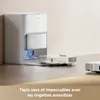 A robot vacuum cleaner docking station with a robot vacuum cleaner in front of it, with text overlaid at the bottom. Produktbild-Vorschau
