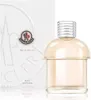 A product shot of Moncler Pour Femme Eau de Parfum with its packaging. Voir les images du produit