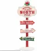 A festive Christmas-themed directional signpost with lights. Podgląd zdjęcia produktu