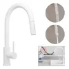 A white kitchen faucet is shown in a studio shot and a lifestyle setting. Produktbild-Vorschau
