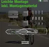 A person riding a bicycle with various components of a bike wall mount displayed around it. Produktbild-Vorschau