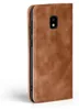 A brown leather flip case for a smartphone, shown from the side with the back camera visible. Produktbild-Vorschau
