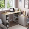A home office corner with a desk, laptop, and decorative items. Anteprima dell’immagine prodotto