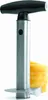 A pineapple corer tool with a stack of pineapple rings. Voir les images du produit