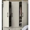 An open wardrobe with clothes hanging inside and shelves with items. Anteprima dell’immagine prodotto