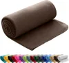 A rolled-up brown fleece blanket is shown with a row of other colored rolled blankets underneath. Náhľad obrázku produktu