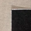 A close-up view of a rug, showing the texture of the pile and the backing. Produktbild-Vorschau