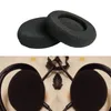 Two pairs of black foam headphone ear pads are shown, one pair stacked on top of the other. Below this, a pair of headphones with black ear pads is shown. Produktbild-Vorschau