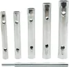 A set of five metal tube socket wrenches of varying lengths, arranged vertically, with a single wrench lying horizontally below them. Produktbild-Vorschau
