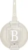 A cream-colored Berlinger Haus wok pan with a white handle, shown from the back with a label attached. Anteprima dell’immagine prodotto
