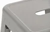 A close-up view of the top surface of a silver metal stool. Náhľad obrázku produktu