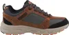 A side view of a brown and gray athletic shoe. Produktbild-Vorschau