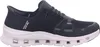 A side view of a black Skechers shoe with a white sole. Voir les images du produit