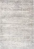A flat lay of a rug with a distressed, patterned design. Anteprima dell’immagine prodotto