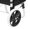 Close-up of a shopping trolley wheel and frame. Produktbild-Vorschau