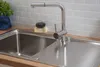 A close-up view of a stainless steel kitchen sink with a faucet. Produktbild-Vorschau