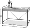 A desk with dimensions shown, featuring a lamp and a vase with flowers. Voir les images du produit