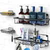 Bathroom shelves with various toiletries and accessories mounted on a tiled wall. Náhled obrázku produktu