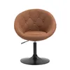A brown tufted armchair with a black adjustable pedestal base. Produktbild-Vorschau