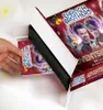 A hand is shown inserting a card into an open advent calendar box. Produktbild-Vorschau