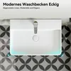 A top-down view of a modern white ceramic sink with a chrome faucet, set against a patterned tile background. Blue light accents the edge of the sink. Anteprima dell’immagine prodotto