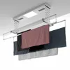 A ceiling-mounted automatic clothes drying rack with clothes hanging on it. Produktbild-Vorschau