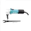 A Makita JN1601 Knabber is shown on a white background with its accessories. Podgląd zdjęcia produktu
