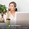 A woman is sitting at a desk with a laptop and a coffee cup, holding a vape pen. Produktbild-Vorschau