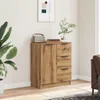 A modern wooden cabinet with drawers and a door, placed against a white wall next to a large plant. Anteprima dell’immagine prodotto