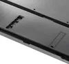 Close-up view of the textured back panel of a television, showing mounting points and ventilation. Produktbild-Vorschau