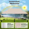 A beige canopy tent set up on a grassy area near a lake, with mountains in the background. Náhled obrázku produktu