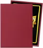 A close-up view of two card sleeves, one red and one showing a gold and black design. Produktbild-Vorschau