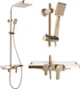 A gold shower set displayed against a white background. Podgląd zdjęcia produktu