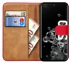 A book-style phone case with a Samsung Galaxy S20 Ultra phone inside, showing a credit card and euro banknotes in the case's slots. Produktbild-Vorschau