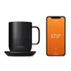 A black Ember Mug 2 and its charging coaster are shown next to a smartphone displaying the Ember app. Náhled obrázku produktu